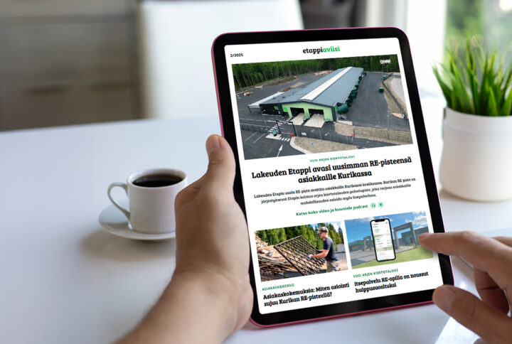 male hand holding computer tablet with isolated screen in cafe